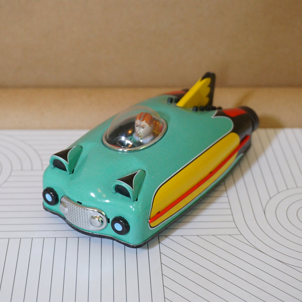 2009 Retro-Modern SCHYLLING Tin Litho Amazing Green and Yellow Future Rocket Car. 5.5" Long.