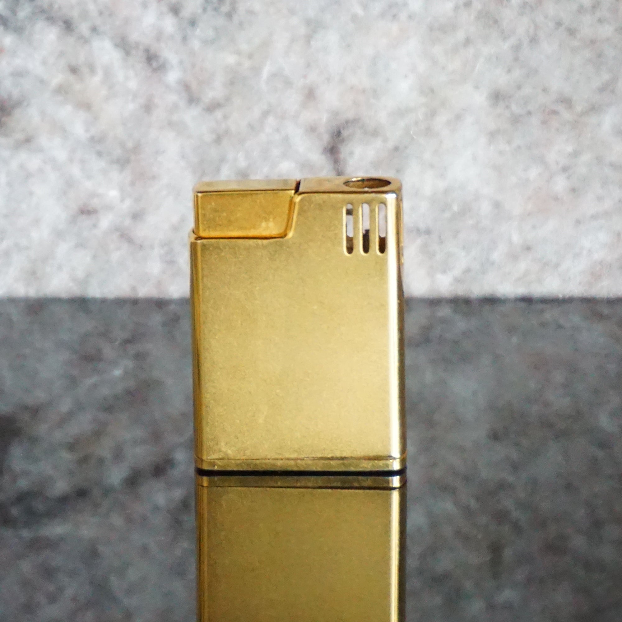Collectible Vintage Gold Toned Piezoelectric Butane Lighter from SCRIPTO. Made in Japan.