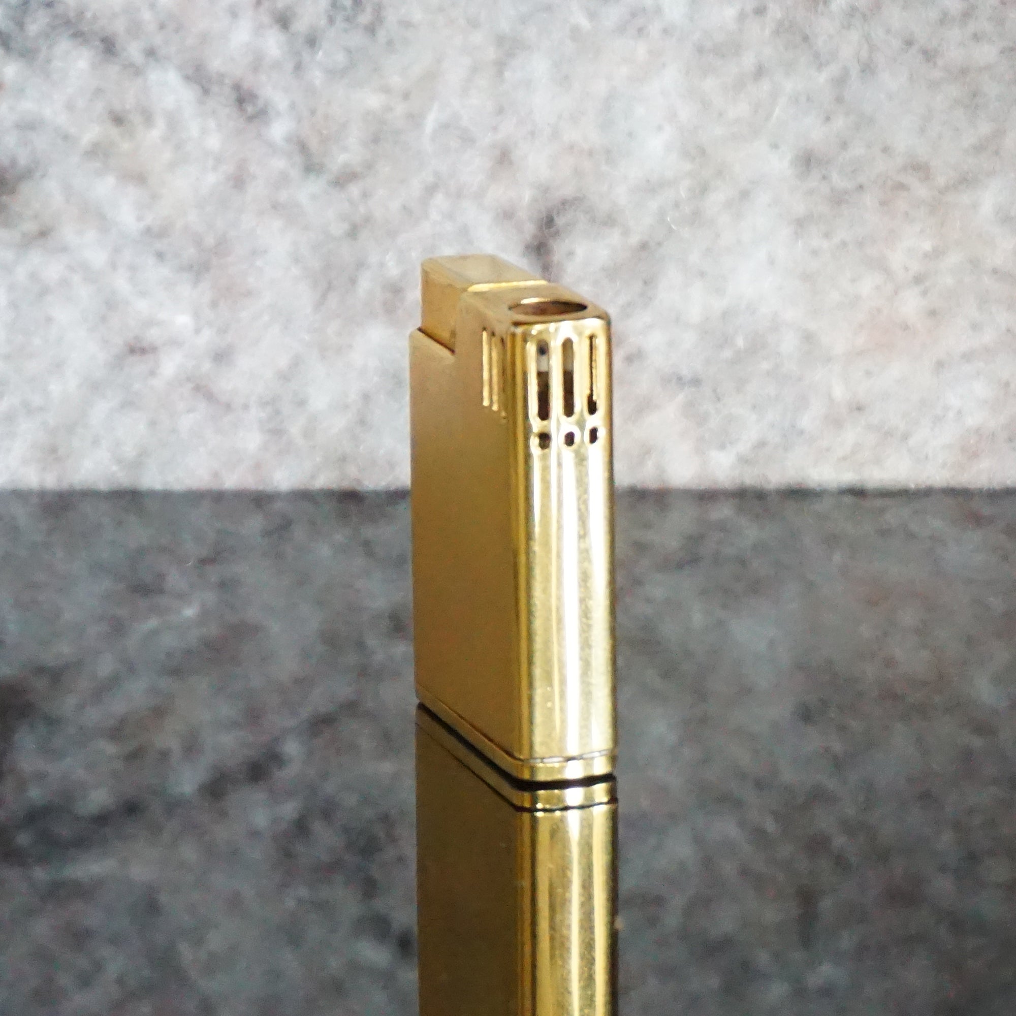 Collectible Vintage Gold Toned Piezoelectric Butane Lighter from SCRIPTO. Made in Japan.