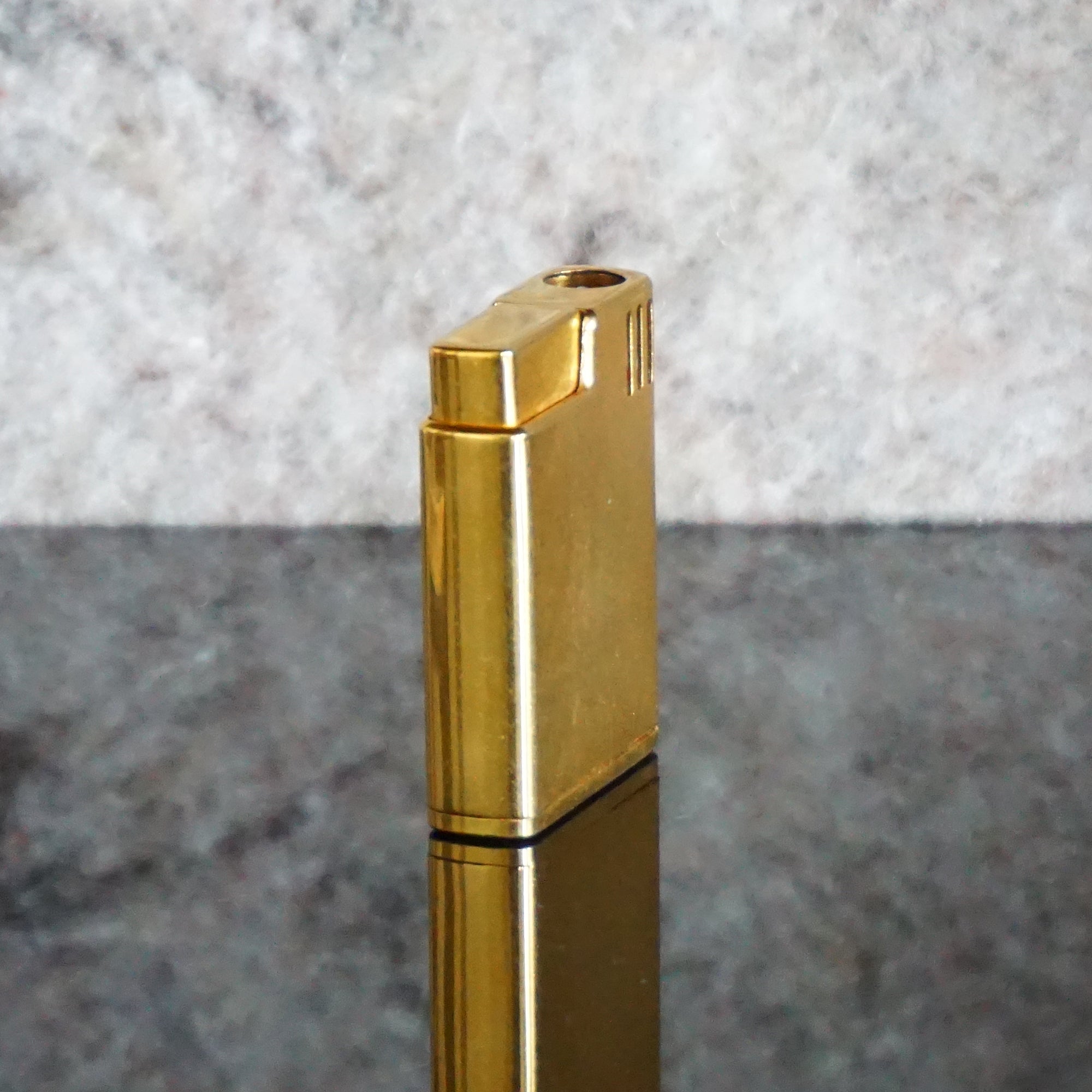 Collectible Vintage Gold Toned Piezoelectric Butane Lighter from SCRIPTO. Made in Japan.