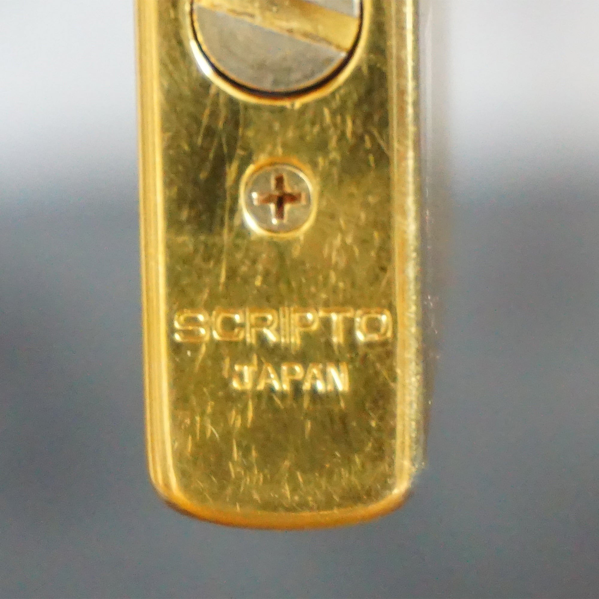 Collectible Vintage Gold Toned Piezoelectric Butane Lighter from SCRIPTO. Made in Japan.