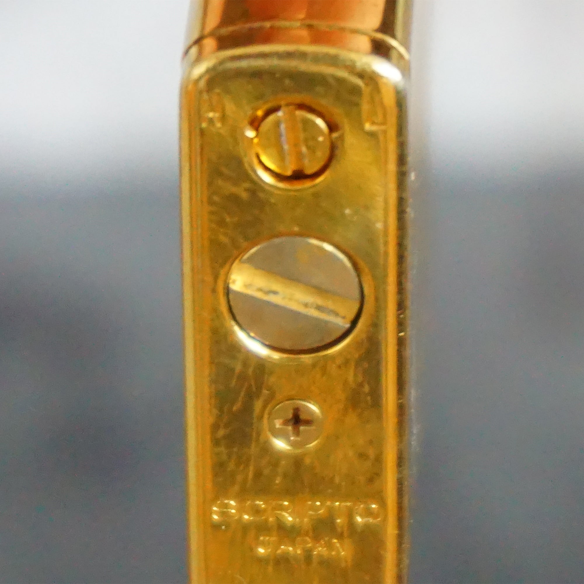 Collectible Vintage Gold Toned Piezoelectric Butane Lighter from SCRIPTO. Made in Japan.