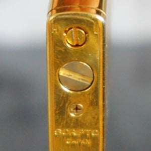 Collectible Vintage Gold Toned Piezoelectric Butane Lighter from SCRIPTO. Made in Japan.