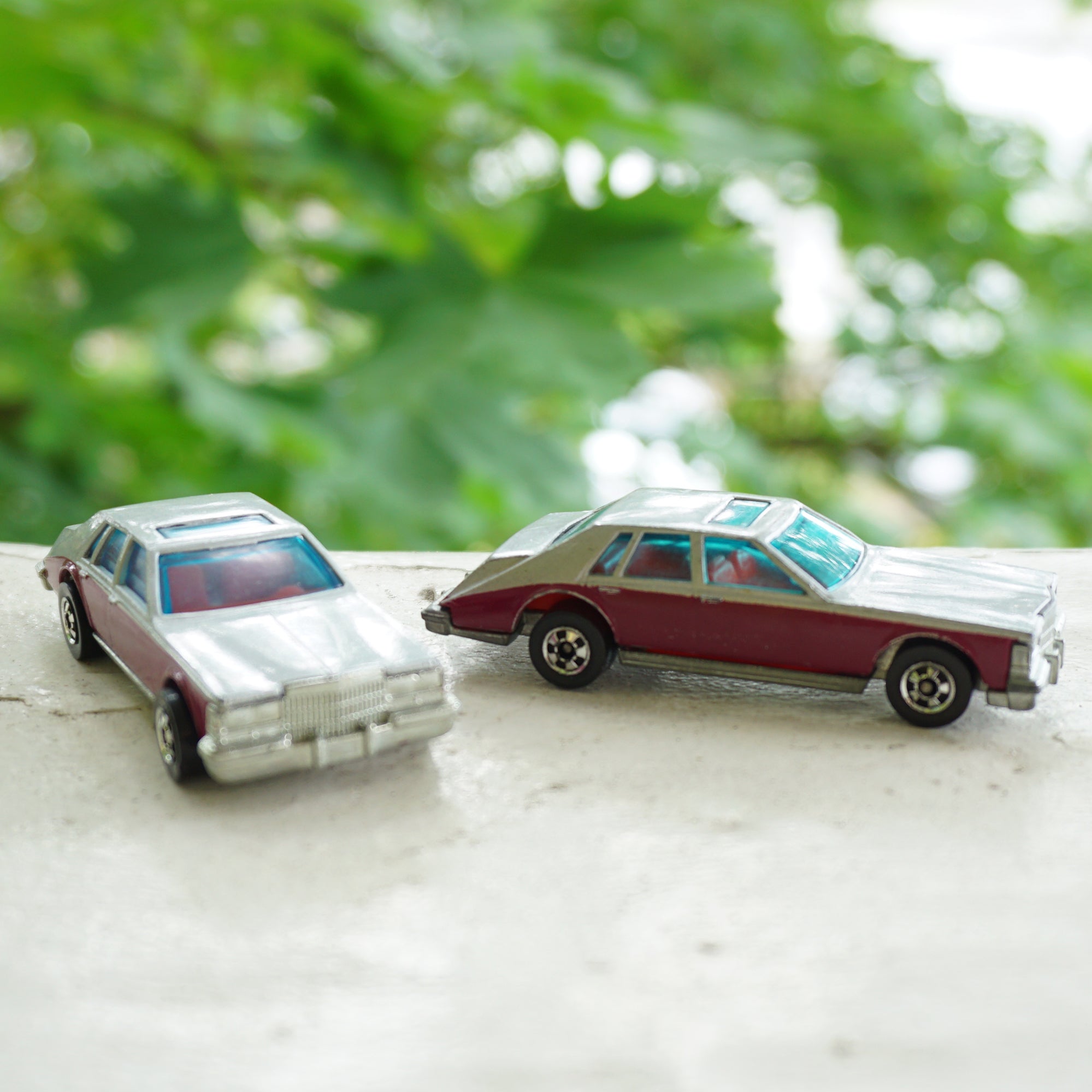 1980 Lot of 2 Vintage Diecast HOT WHEELS Cadillac Seville Burgundy Grey Cars. No. 1698. Made by Mattel, Inc.