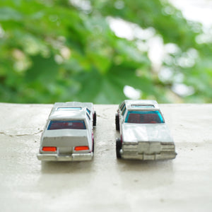 1980 Lot of 2 Vintage Diecast HOT WHEELS Cadillac Seville Burgundy Grey Cars. No. 1698. Made by Mattel, Inc.