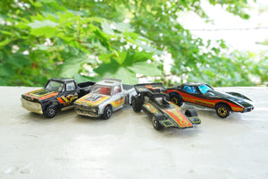 1982 Vintage HOT WHEELS Ferrari Racebait 308 Turbo SIlver Car with Red and Yellow Detail. Made by Mattel, Inc.