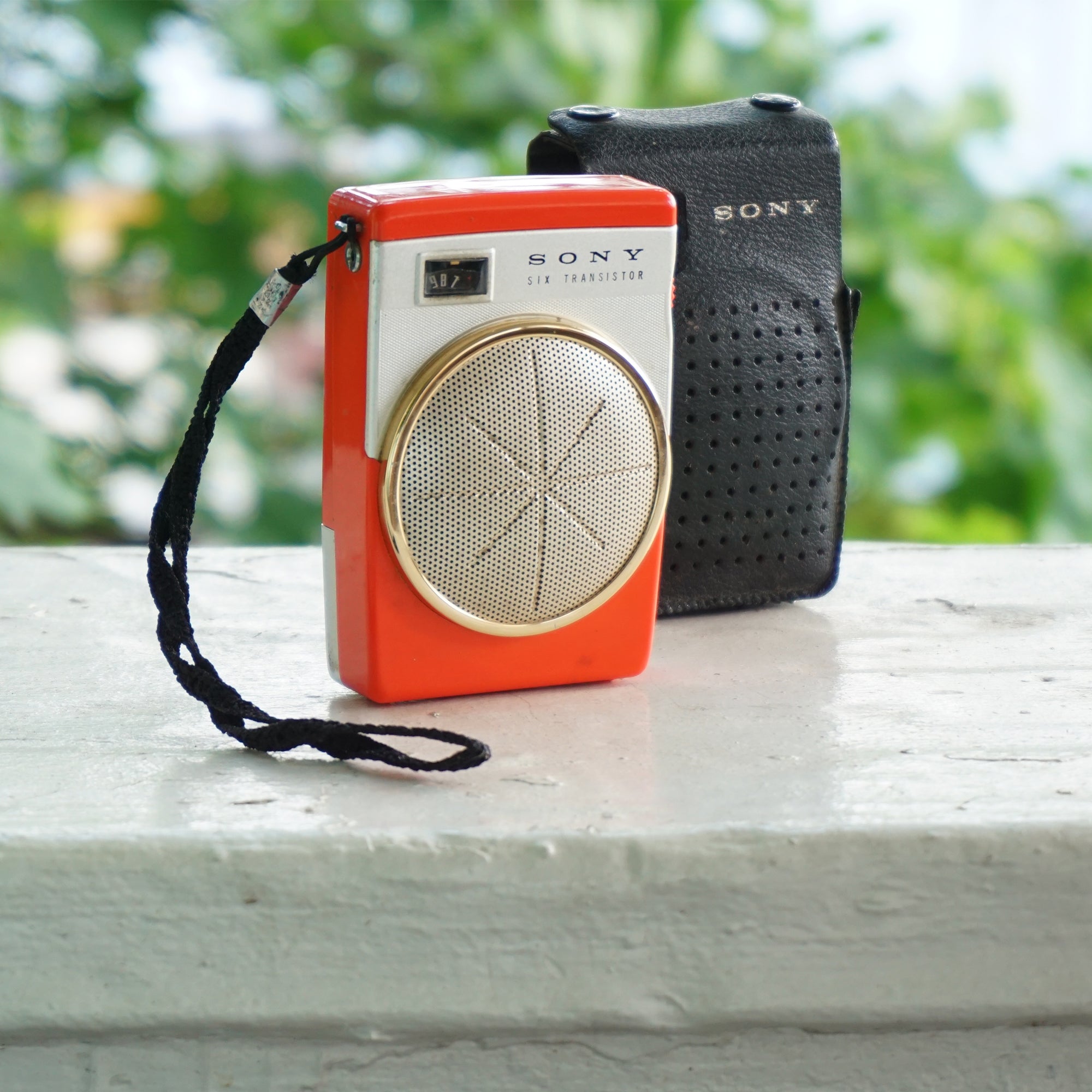 1960s Rare Vintage SONY Six Transistor Orange Pocket Radio with Leather Case. Model: TR-620. Made in Japan.