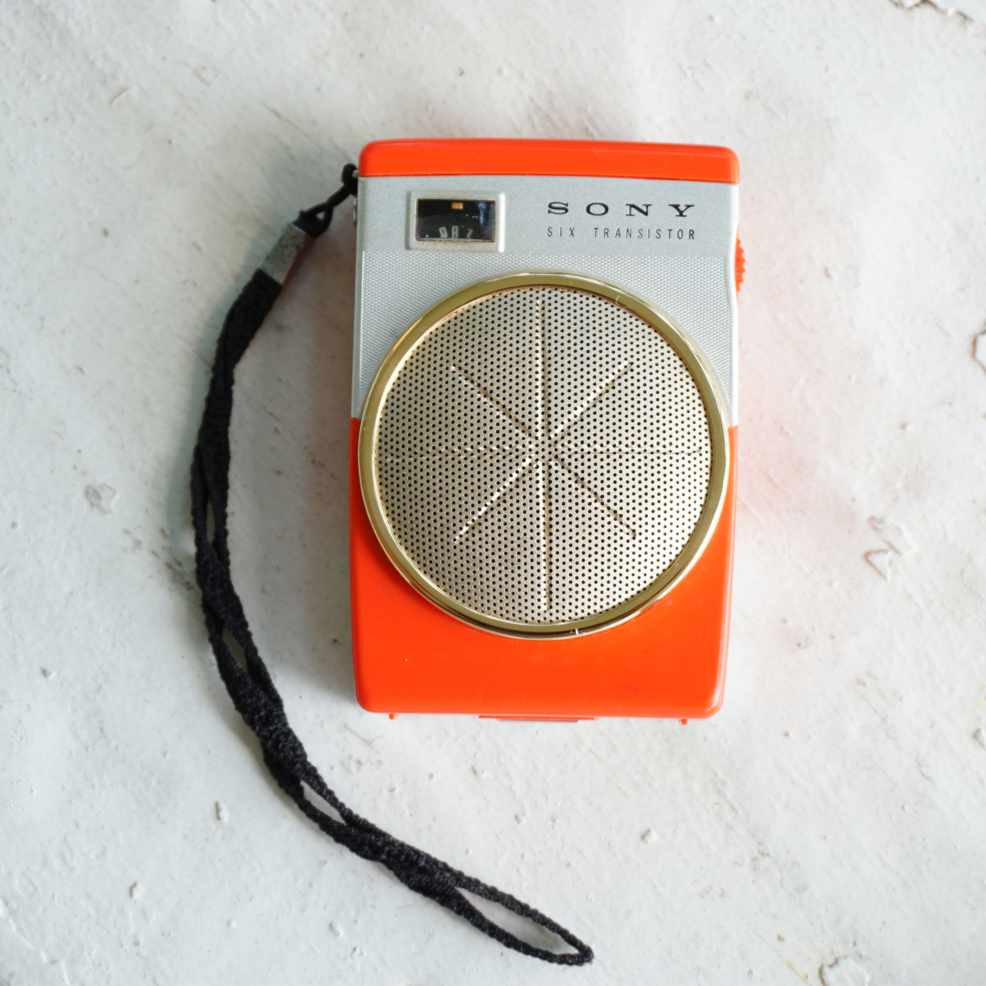 1960s Rare Vintage SONY Six Transistor Orange Pocket Radio with Leather Case. Model: TR-620. Made in Japan.