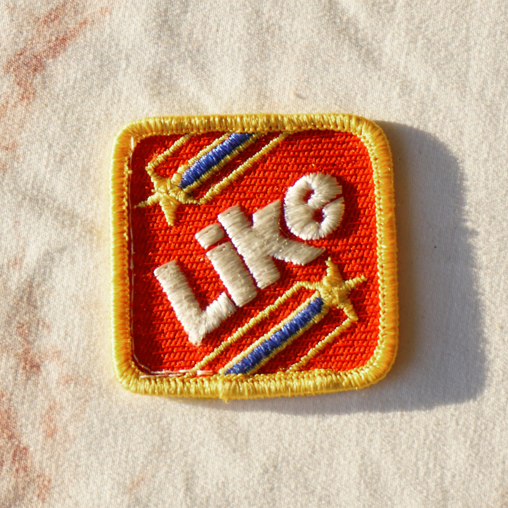 1980s Vintage 2" LIKE with Stars Clothing Patch. Red, Gold, Blue and White Colors.