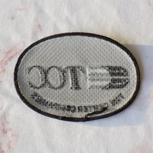 1980s Vintage 4" TCC The Center Companies Clothing Patch. Black and Grey Colors.