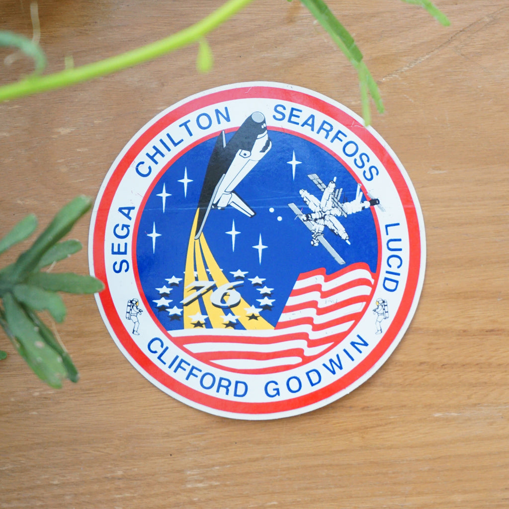 1996 Vintage 3.5" STS-76 Sticker Crew Patch for NASA's 76th Shuttle Mission. Shows Space Shuttle Atlantis and Russian Space Station.