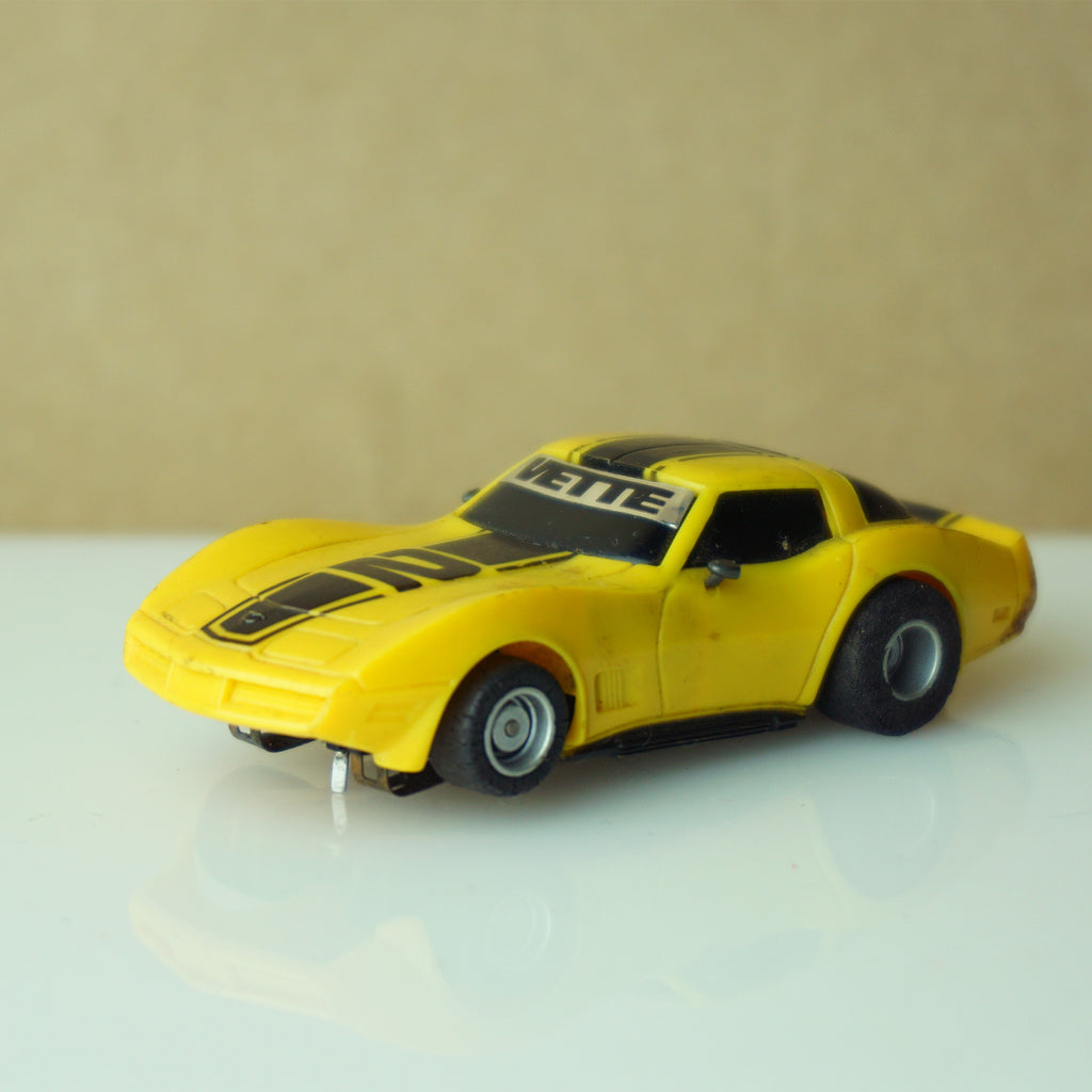 1981–1982 Vintage TYCO 1979 Chevy Corvette #2 Stripes Yellow and Black Slot Car.