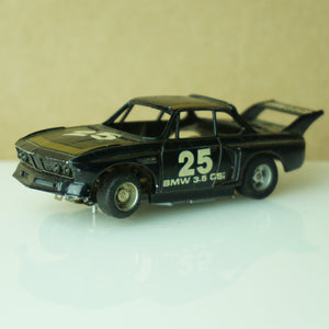 Vintage TYCO BMW 3.5 CSI #25 Stripes Black and Gold Slot Car. Made in Hong Kong.