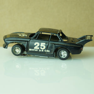 Vintage TYCO BMW 3.5 CSI #25 Stripes Black and Gold Slot Car. Made in Hong Kong.