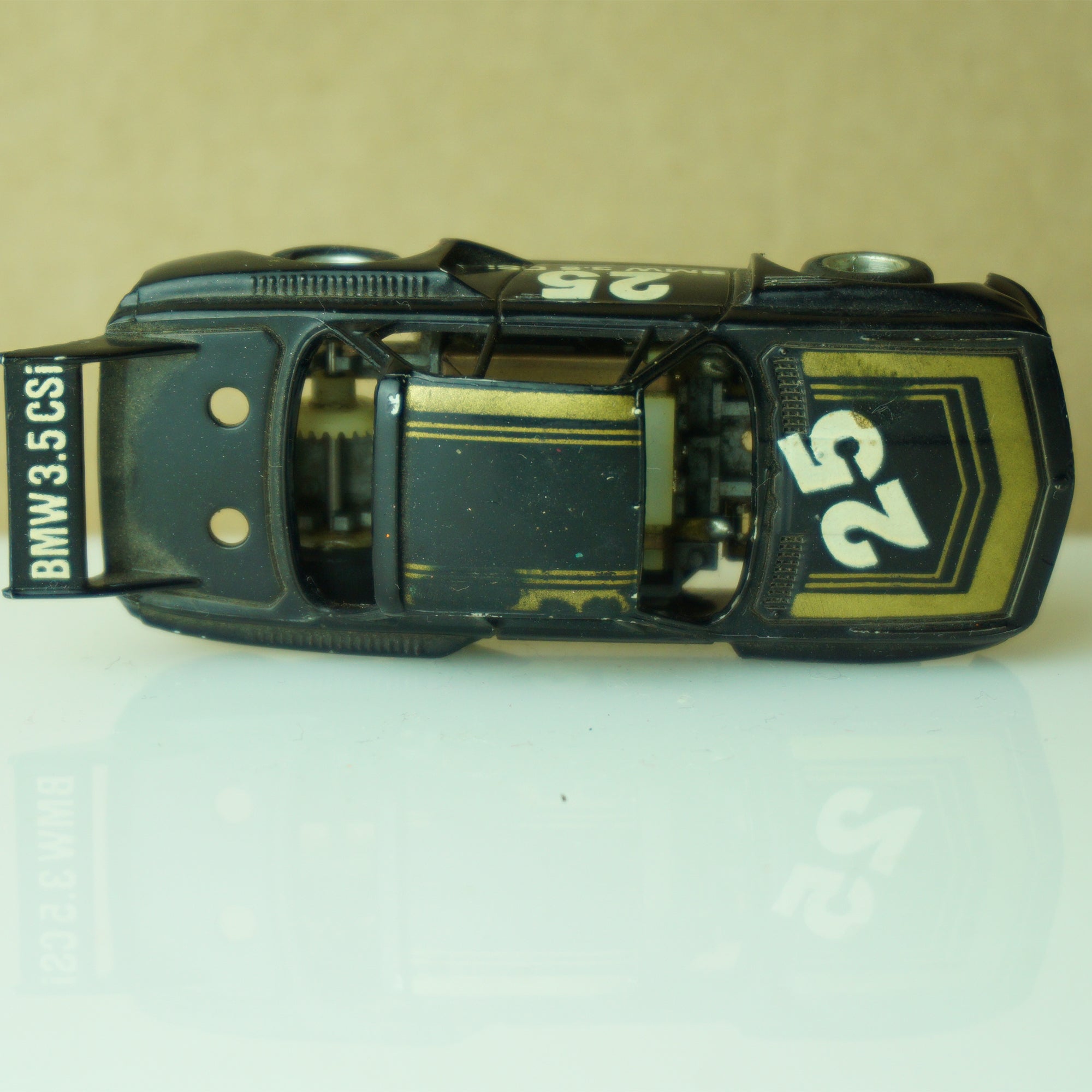 Vintage TYCO BMW 3.5 CSI #25 Stripes Black and Gold Slot Car. Made in Hong Kong.