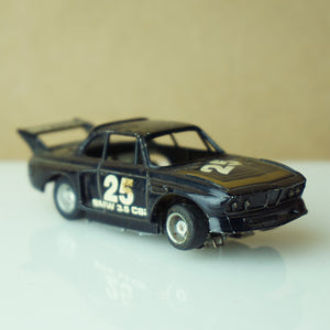 Vintage TYCO BMW 3.5 CSI #25 Stripes Black and Gold Slot Car. Made in Hong Kong.