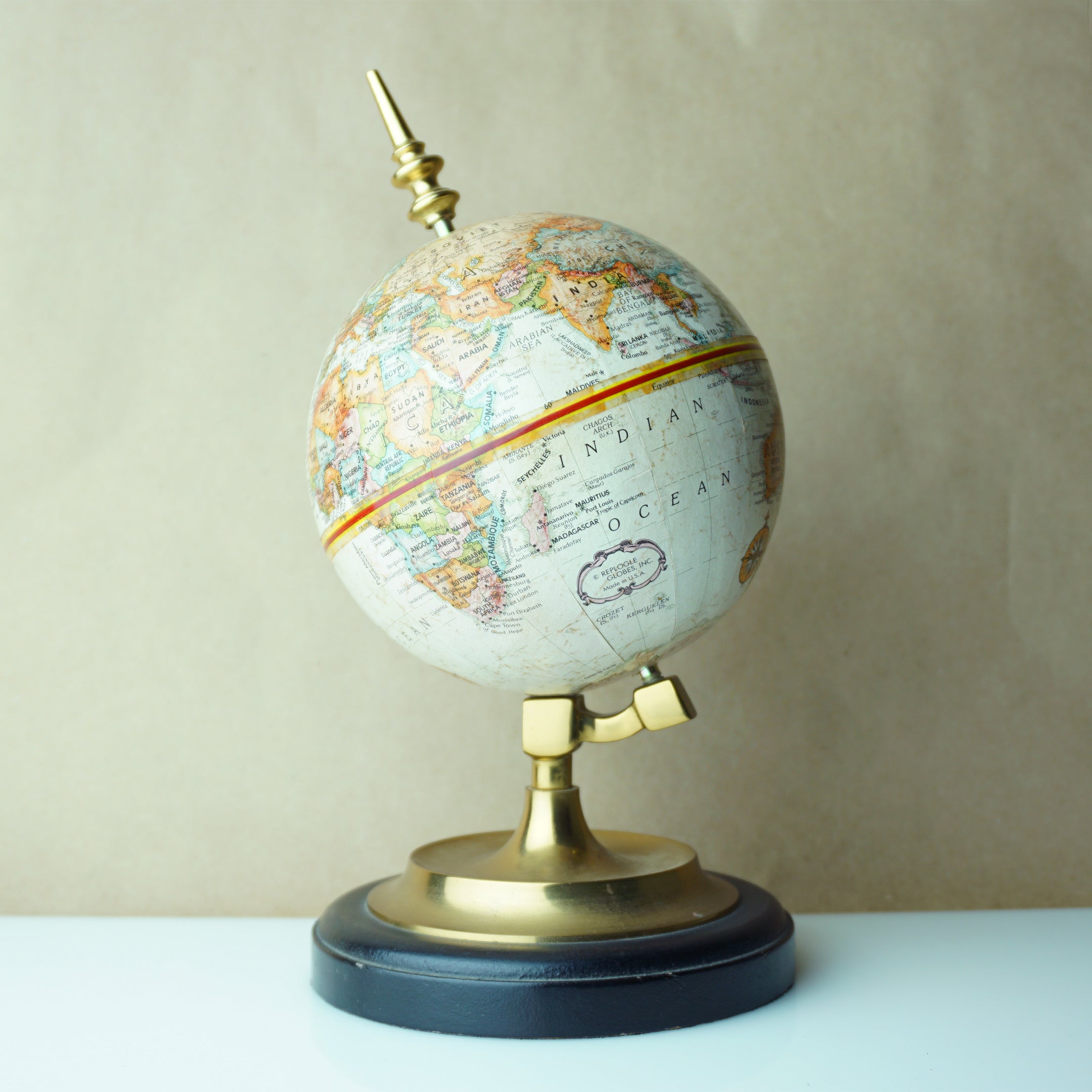 Vintage 9" Replogle World Classic Series Globe. Gold Toned with Black Wood Base. Made in USA.