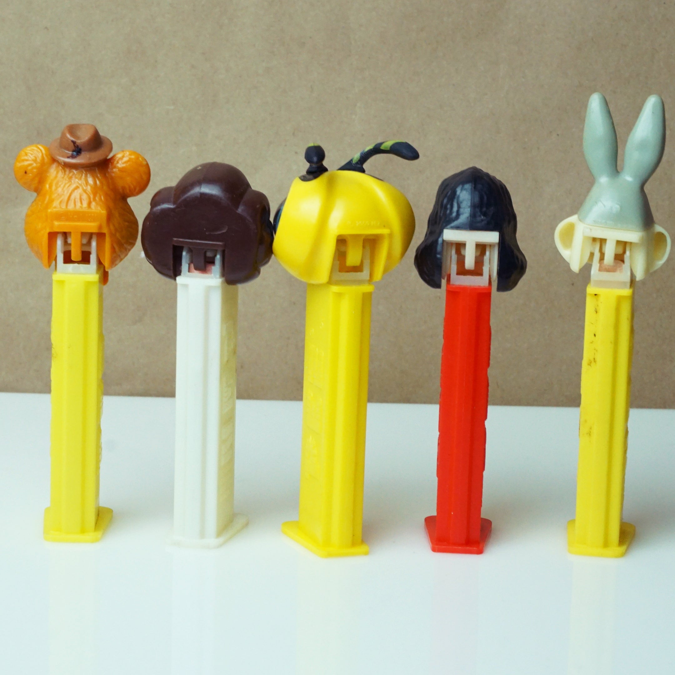 Set of (5) Vintage PEZ Dispensers: Fozzie, Leia, Bee, Wonder Woman, Bugs Bunny