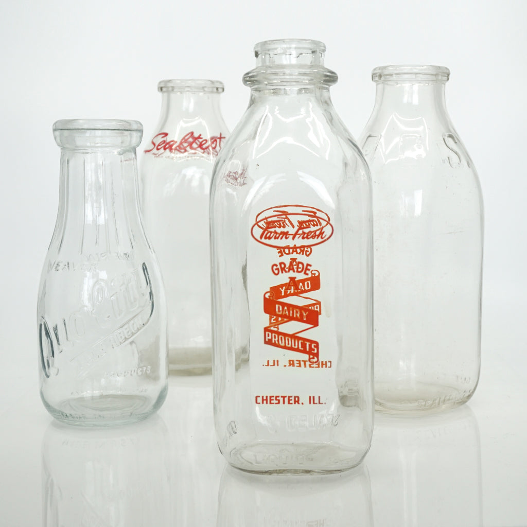 Set of (4) Mid-Century Vintage Milk Bottles. All Made in USA.