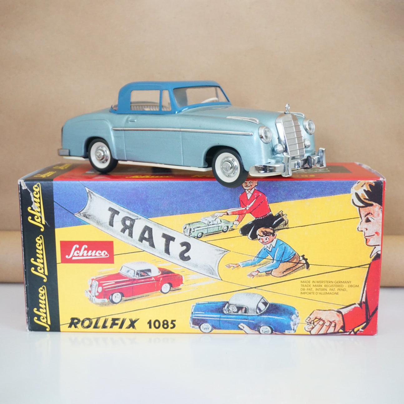 SCHUCO Rollfix #1085 Mercedes-Benz 220S: Blue Coupe