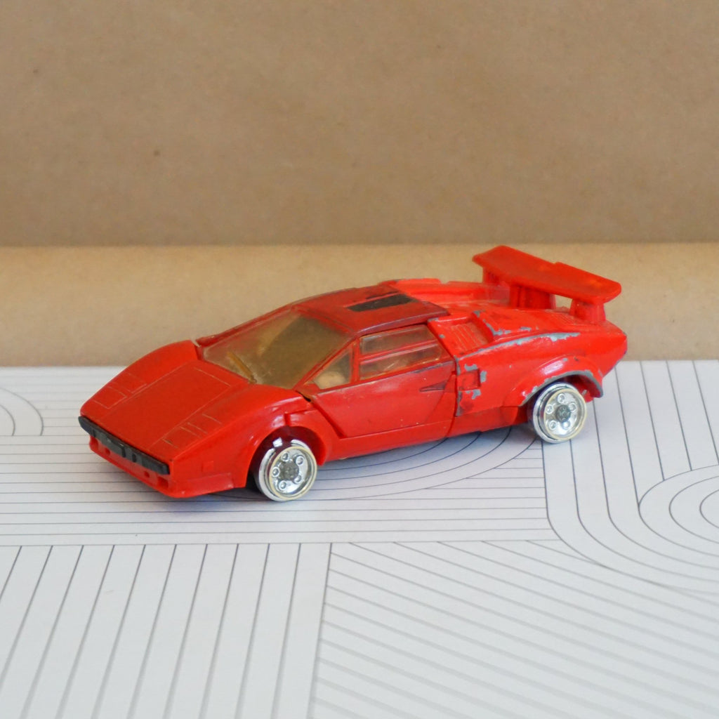 1984 Vintage TAKARA Transformer G1 Autobot Cars: Sideswipe Figure. Made in Japan.