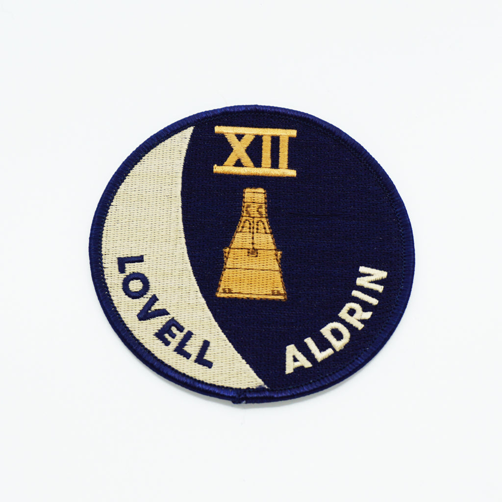 XII Lovell Alderin Clothing Patch. 4" Round. Blue, Brown, Beige Detail.