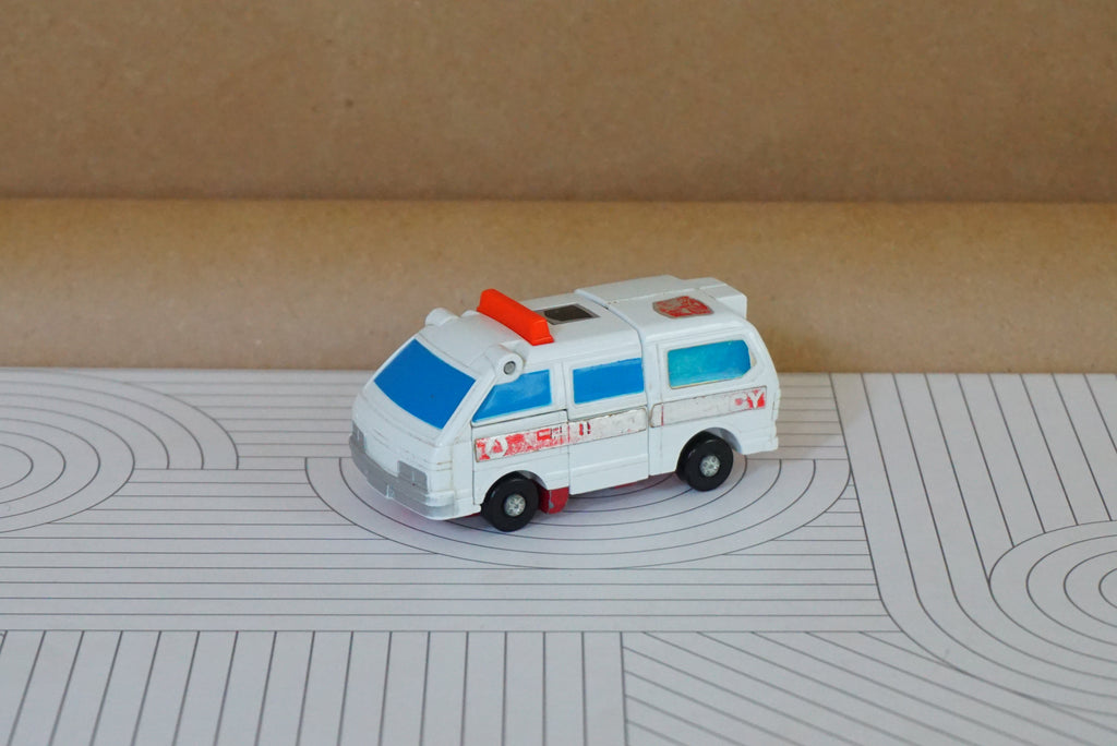 1986 Vintage HASBRO TAKARA Transformer G1 Protectobot (Defensor): First Aid (P4) Toyota MasterAce Surf Ambulance. Made in Japan.