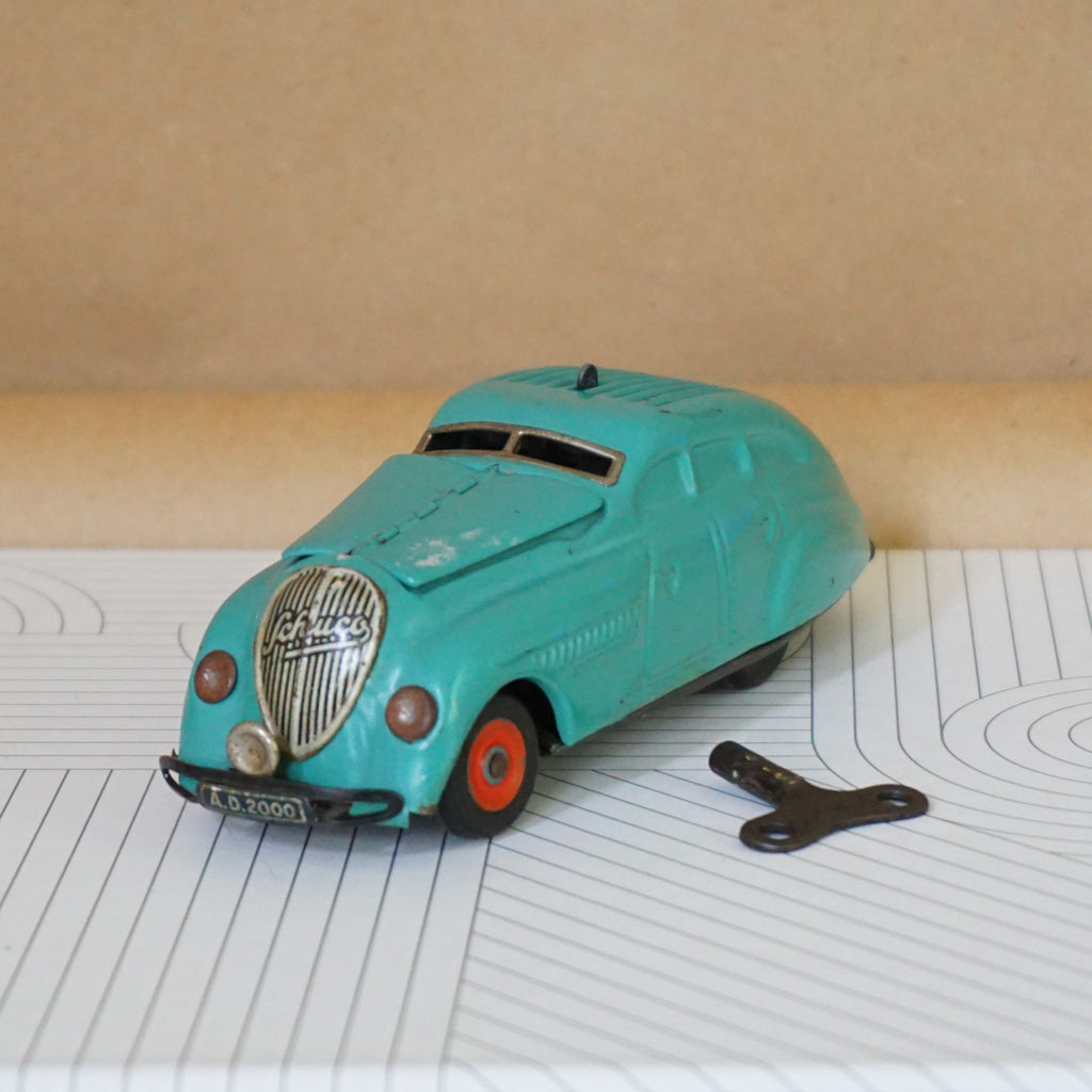 1930s–1940s SCHUCO "Kommando Anno 2000" Teal Wind-Up Car with Key. Made in Germany.