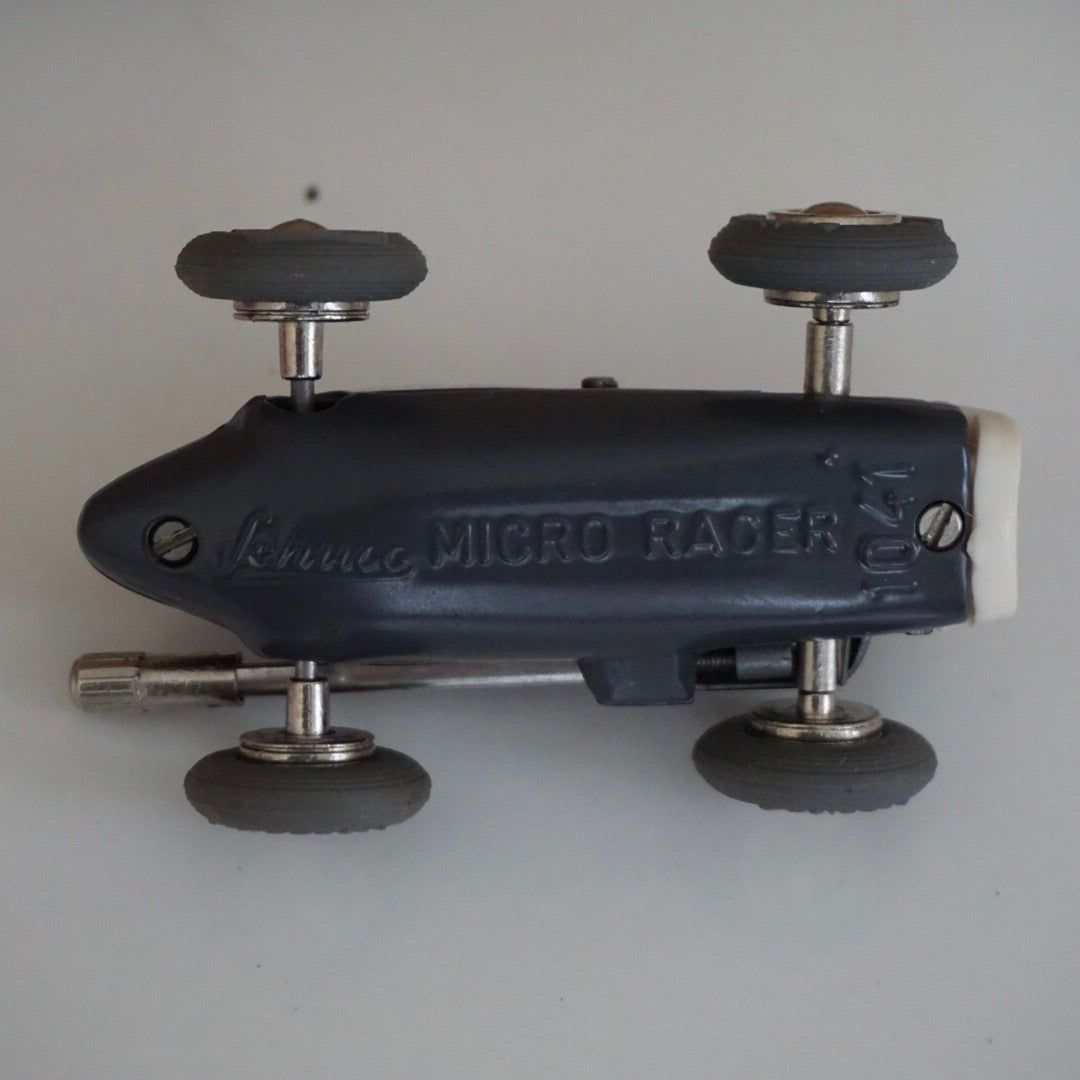 1990s Schuco Midget Micro Black Racer Car #1041. Red interior.