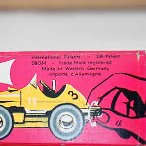 1990s Schuco Midget Micro Black Racer Car #1041. Red interior.
